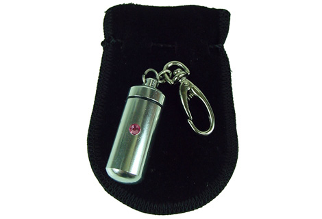 Cápsula prendedora de saquinho com pedrinha rosa